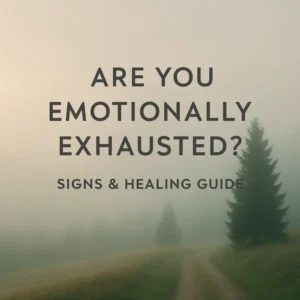 Foggy landscape with a winding path and dark text reading ‘Are You Emotionally Exhausted? Signs & Healing Guide