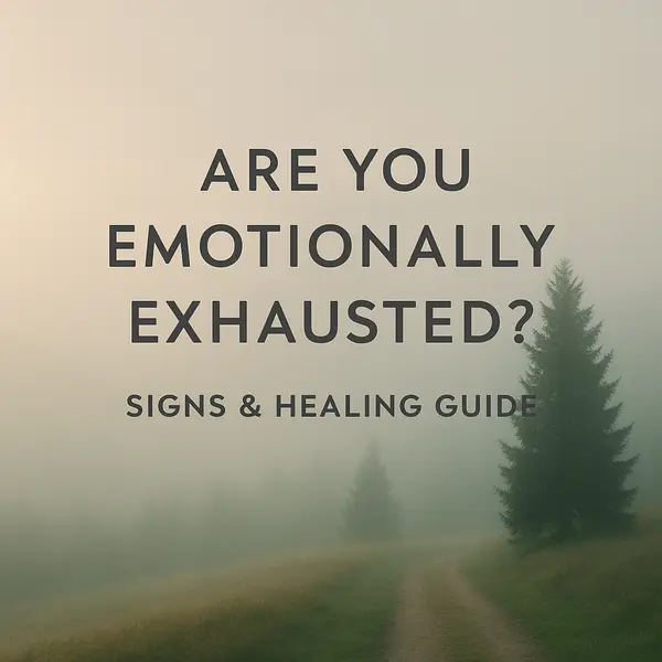 Foggy landscape with a winding path and dark text reading ‘Are You Emotionally Exhausted? Signs & Healing Guide